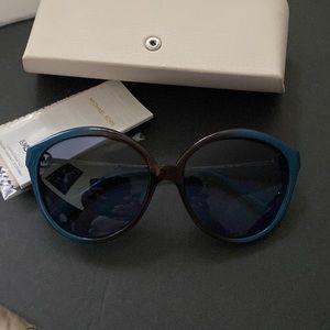 Blue and brown MK glasses